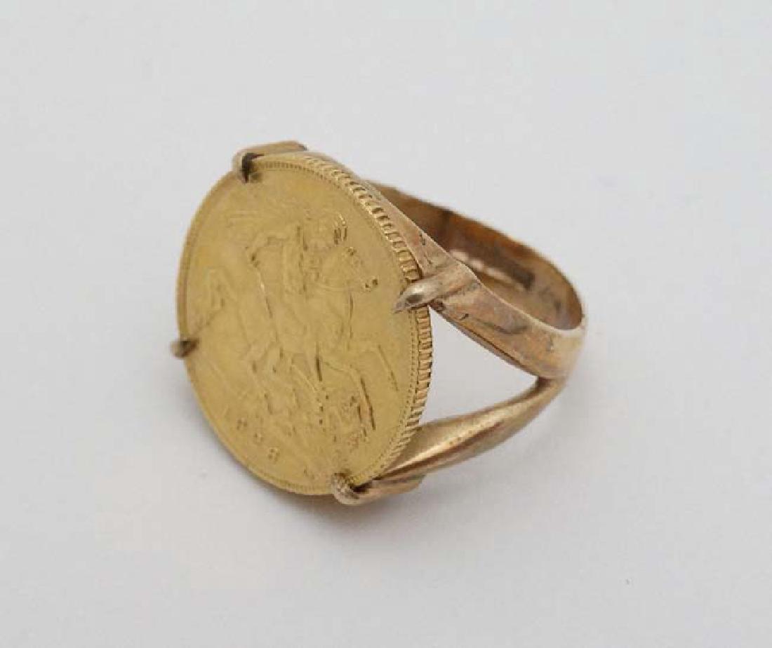A 9ct gold ring set with half sovereign coin dated (1 of 5)