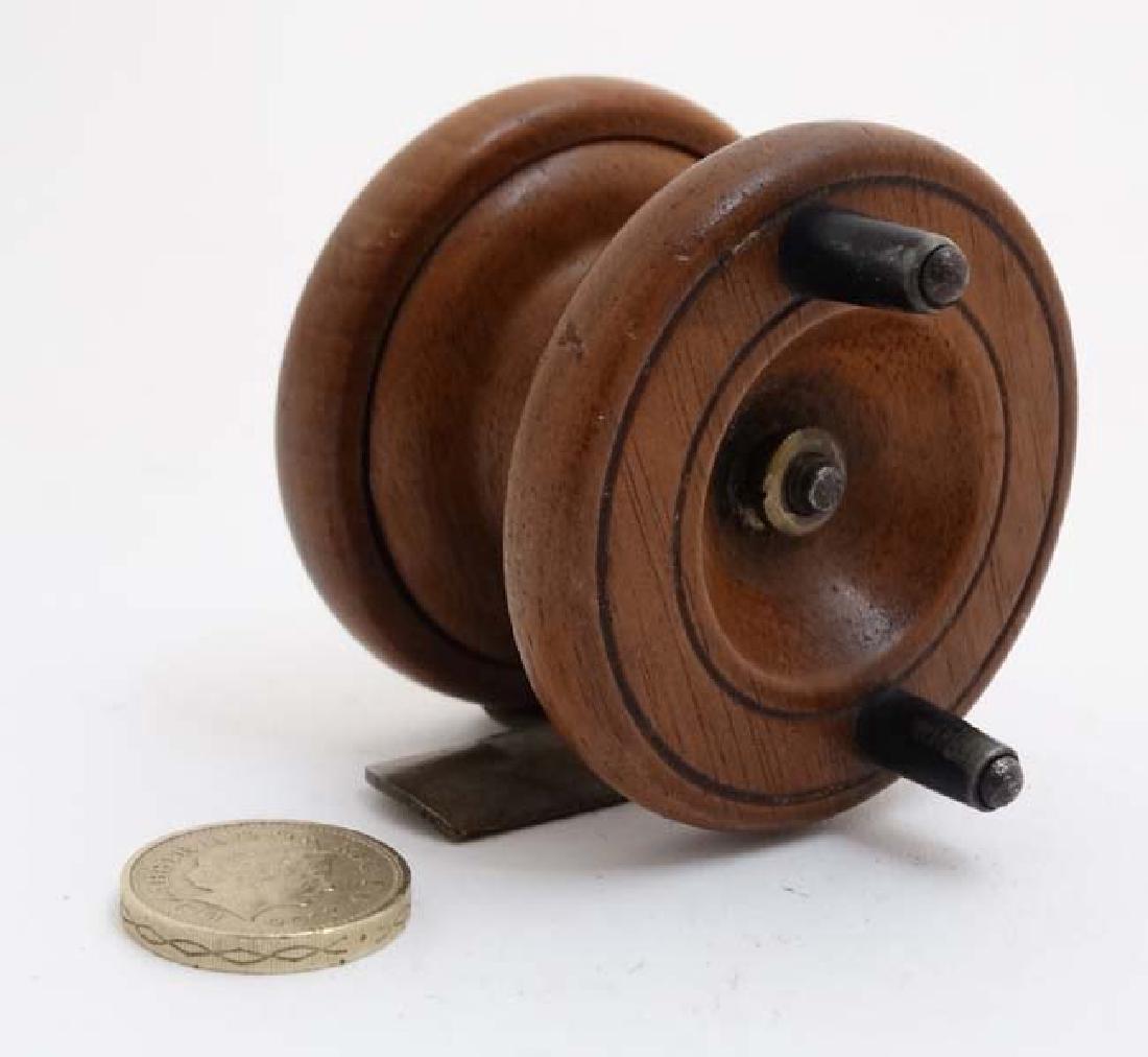 Fly Fishing : An old mahogany and brass 2 3/8 ''reel: Fly Fishing : An old mahogany and brass 2 3/8 ''reel with two ebonised horn handles.