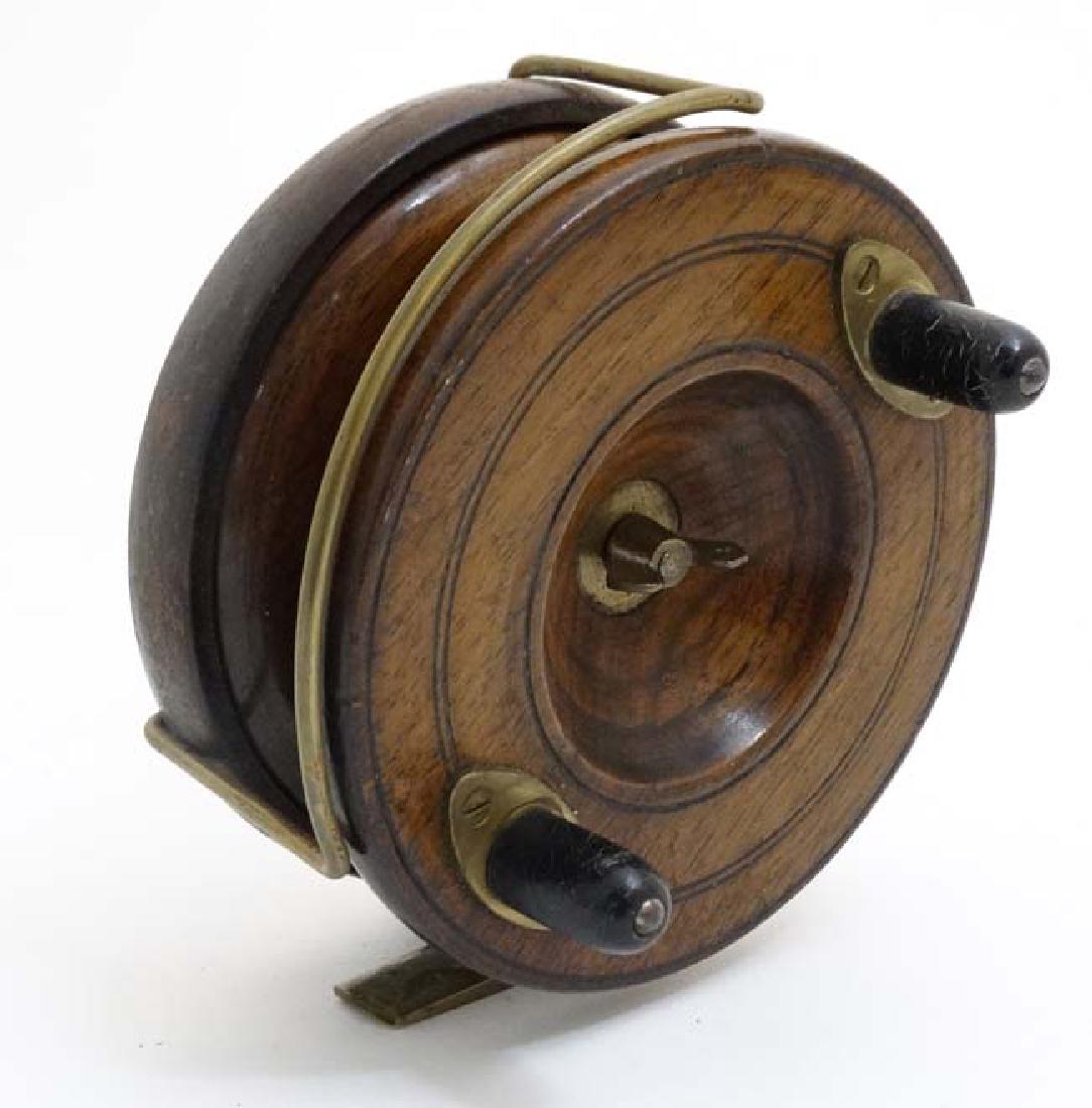 Fly Fishing : An old Salmon Fly Fishing Reel, a brass: Fly Fishing : An old Salmon Fly Fishing Reel, a brass and mahogany StarBack 5'' Reel 5'' with two horn handles.