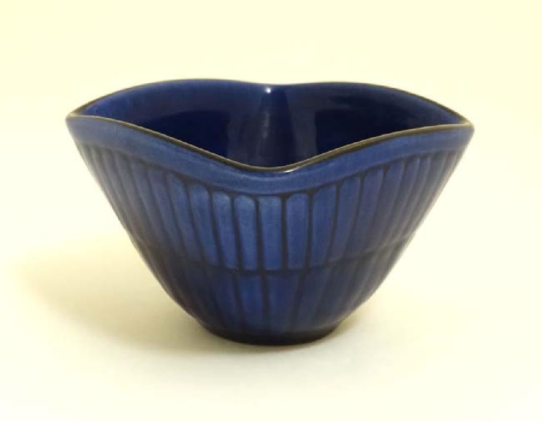 Scandinavian Pottery: A c1970s Upsala Ekeby , Sweden: Scandinavian Pottery: A c1970s Upsala Ekeby , Sweden small bowl of squared form in cobalt blue, bears impressed factory stamp and indistinct signature to base. 4 1/2'' wide.