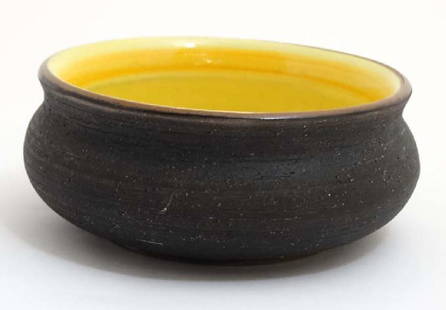 Scandinavian Pottery: A c1970s/80s Gebriel, Sweden: Scandinavian Pottery: A c1970s/80s Gebriel, Sweden studio pottery bowl , possibly by Kjell Blomberg, having yellow interior, bears impressed mark to base. 7 1/2'' diameter,