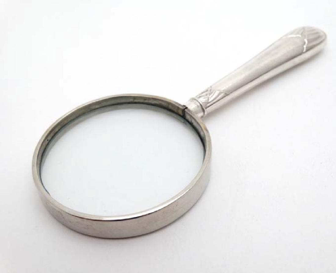 A silver handled magnifying glass 5'' long (1 of 4)