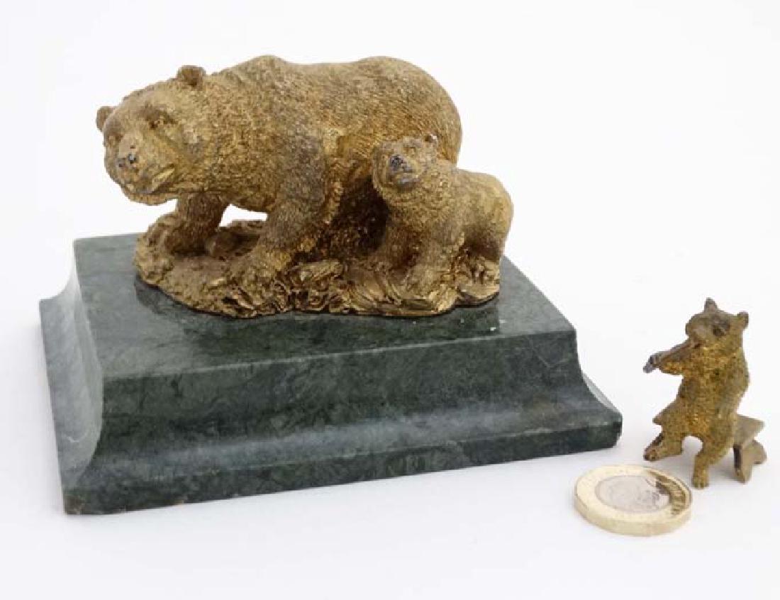 Two gilded Russian bears on a malachite plinth together: Two gilded Russian bears on a malachite plinth together with another smoking a pipe, sitting on a bench. The largest 4 1/2'' long x 3 7/8'' deep x 3'' high