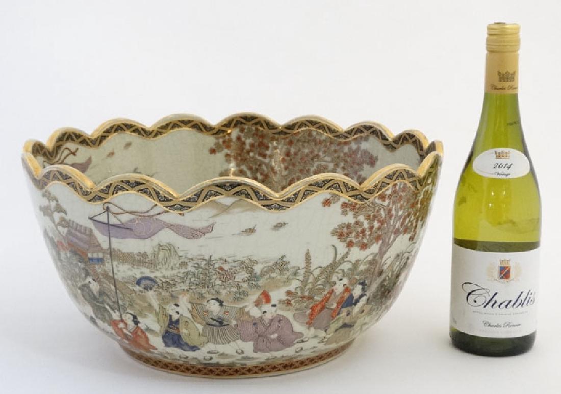 A large Japanese Satsuma bowl having wavy rim and (1 of 4)