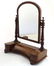 A Victorian dressing table mirror with arch shaped
