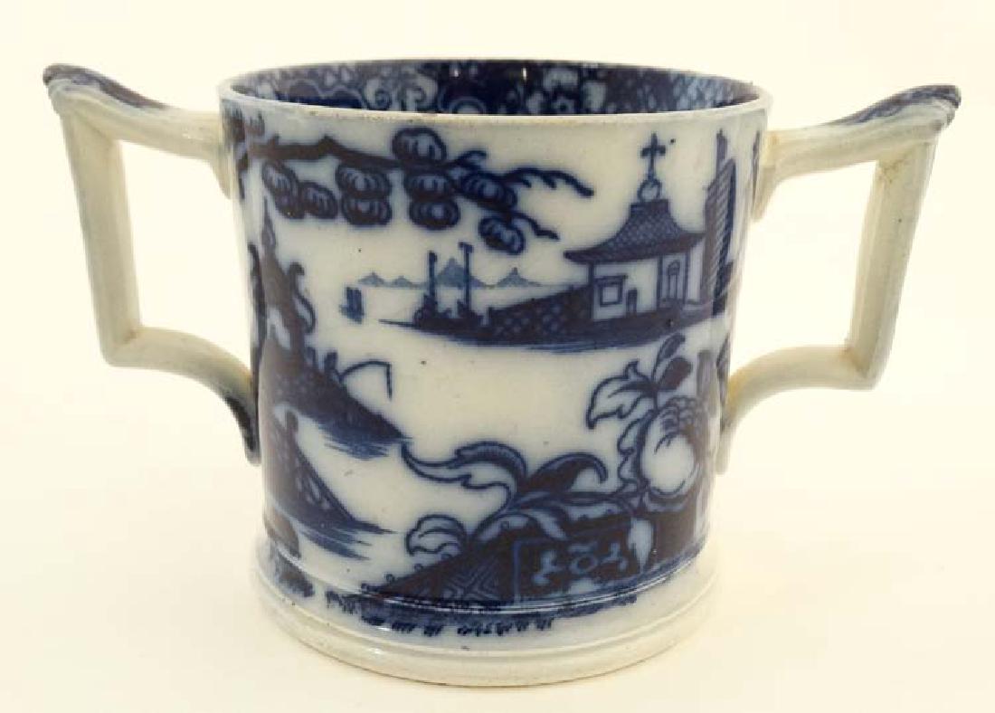 A 19thC Flo Blue twin handled loving cup , having (1 of 4)