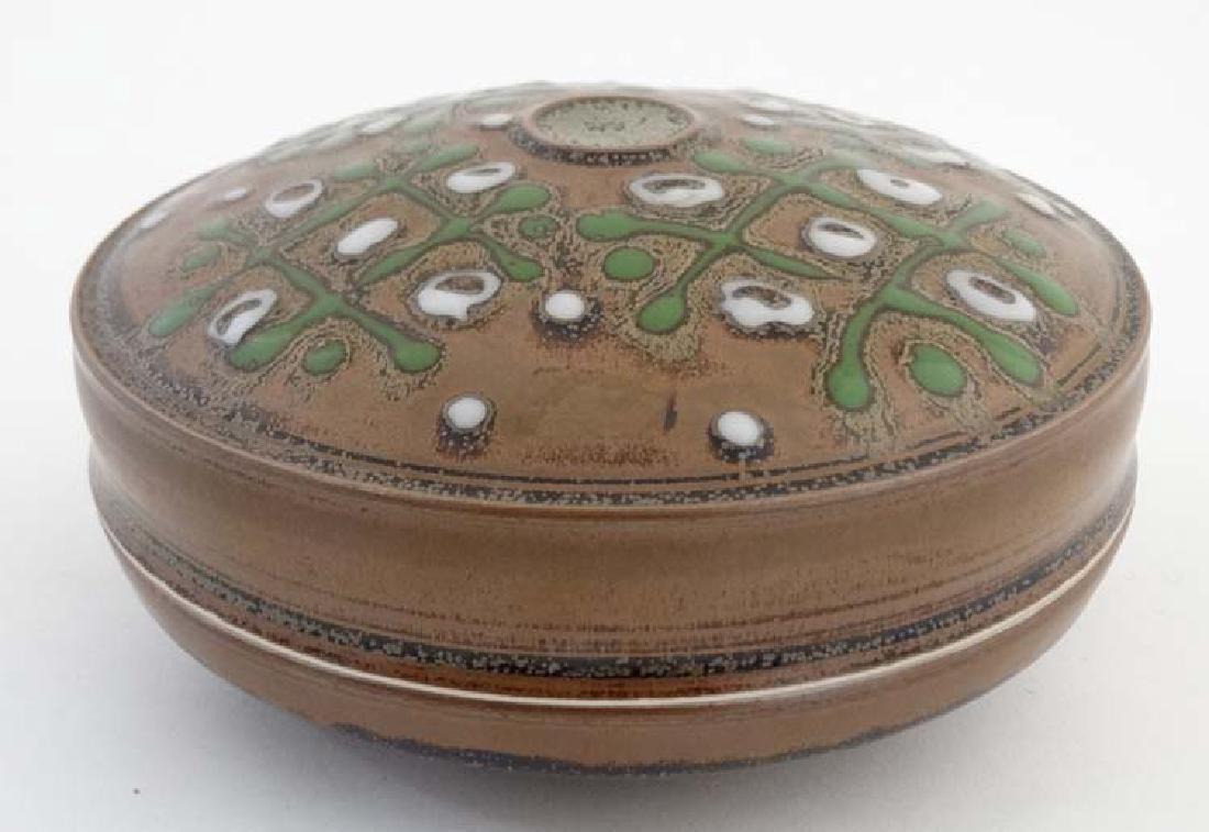 A studio pottery pot with lid, having green and white (1 of 7)