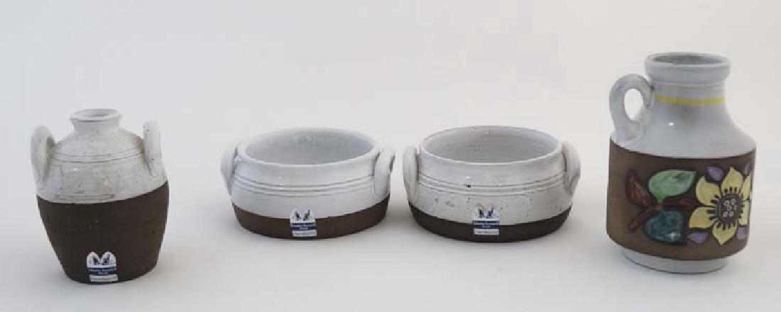 Scandinavian Pottery: A collection of 4 items of: Scandinavian Pottery: A collection of 4 items of pottery to include 2 Kloster Keramik bowls and a vase in white with brown base, together with a Upsala Ekeby vase by Mari Simmulson, numbered 1034 / 19