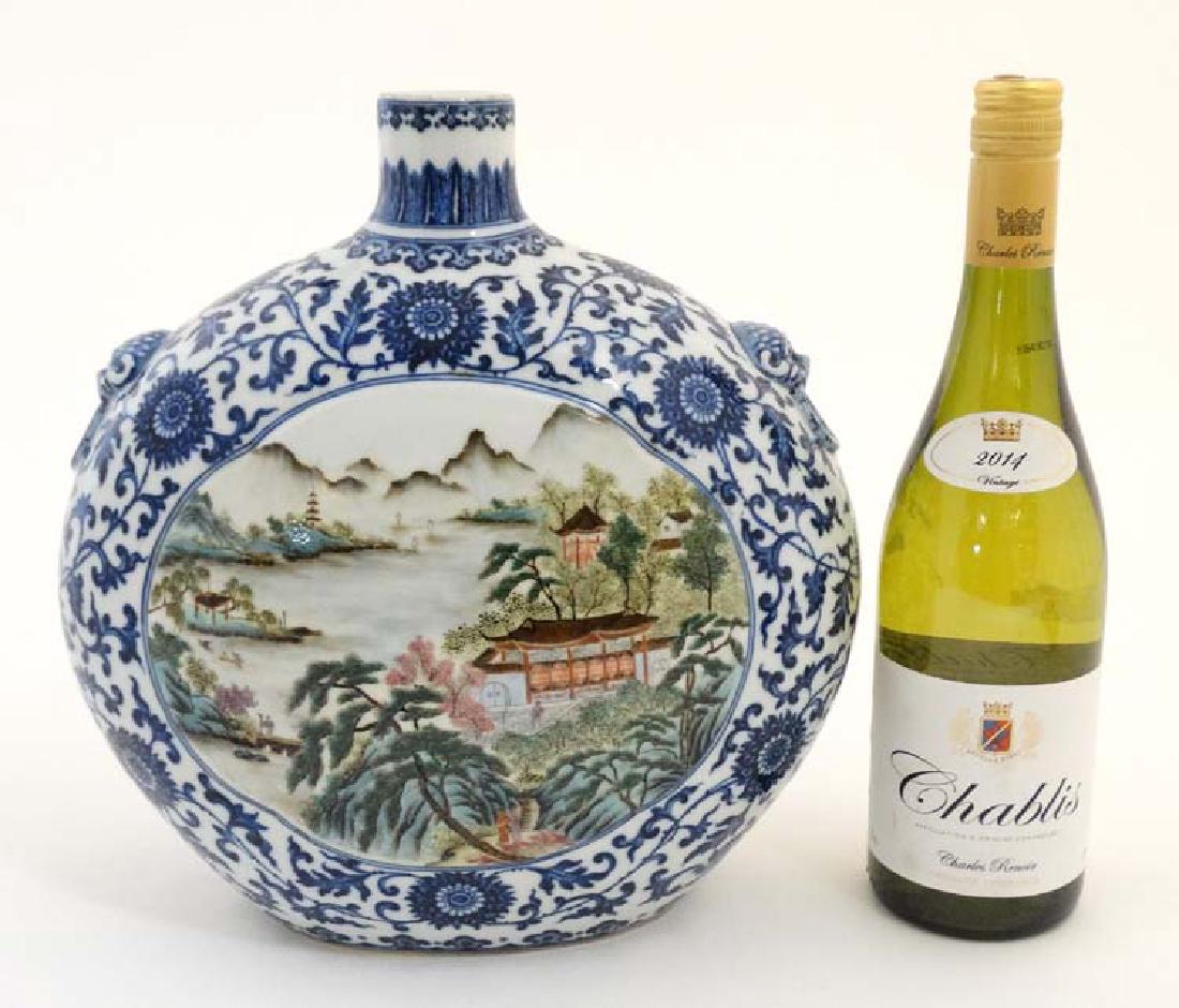 A Chinese blue and white moon flask having panels (1 of 6)