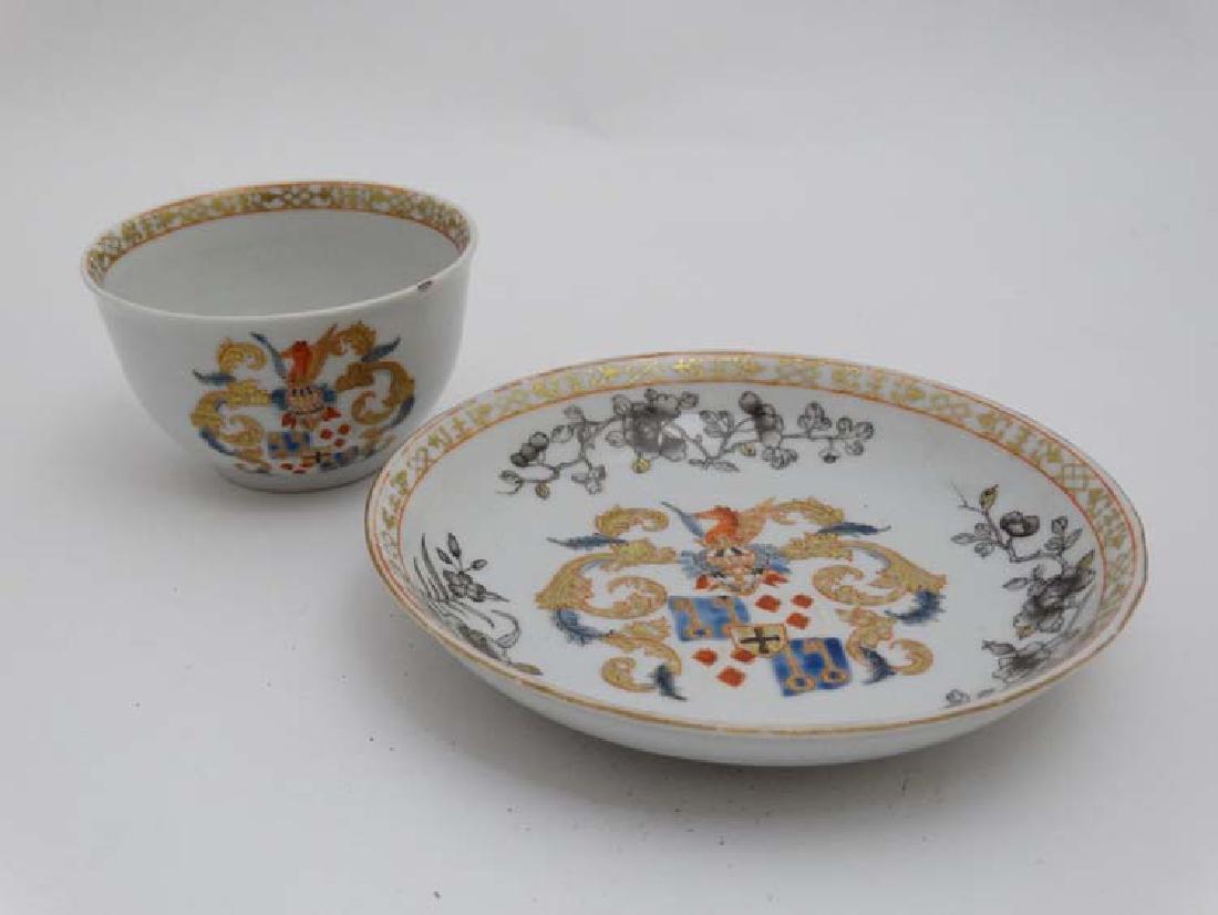 A Chinese Export famille rose  armorial tea bowl and (1 of 6)
