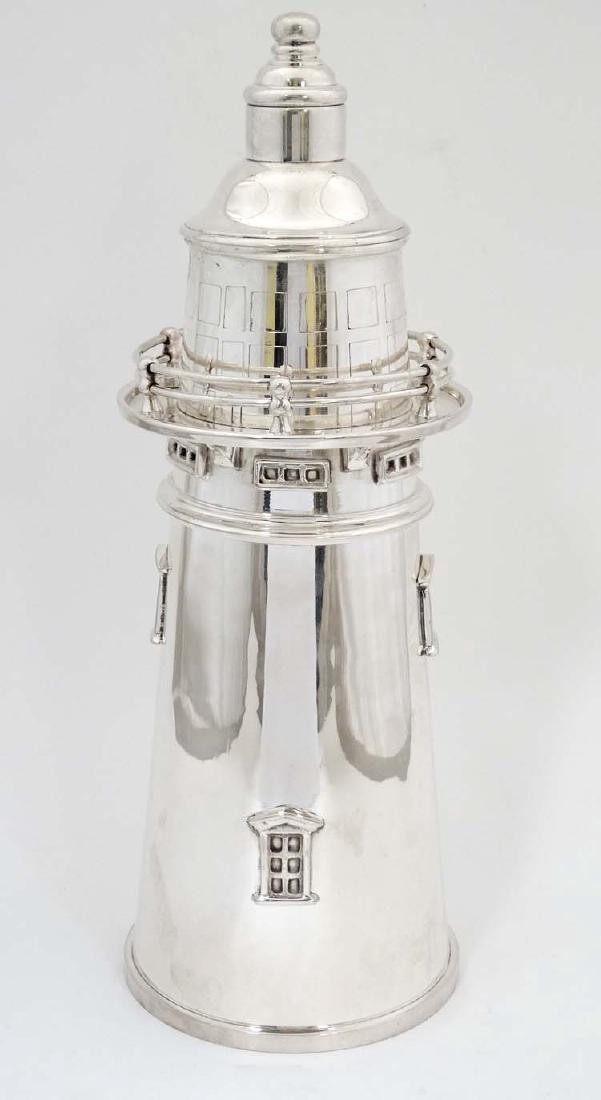 A silver plate novelty cocktail shaker in the form of a (1 of 4)