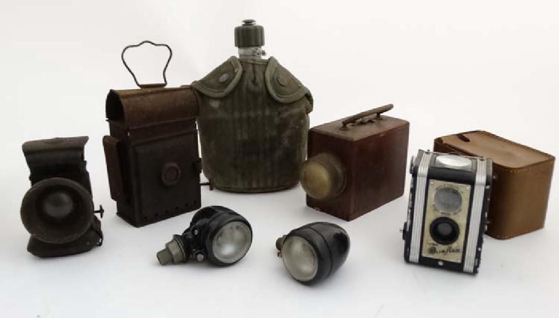 Assorted items to include a US Army - issue water (1 of 2)