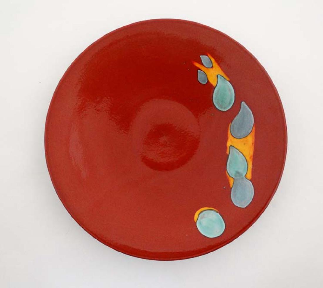 A late 20thC large Poole Pottery charger in Odyssey (1 of 6)