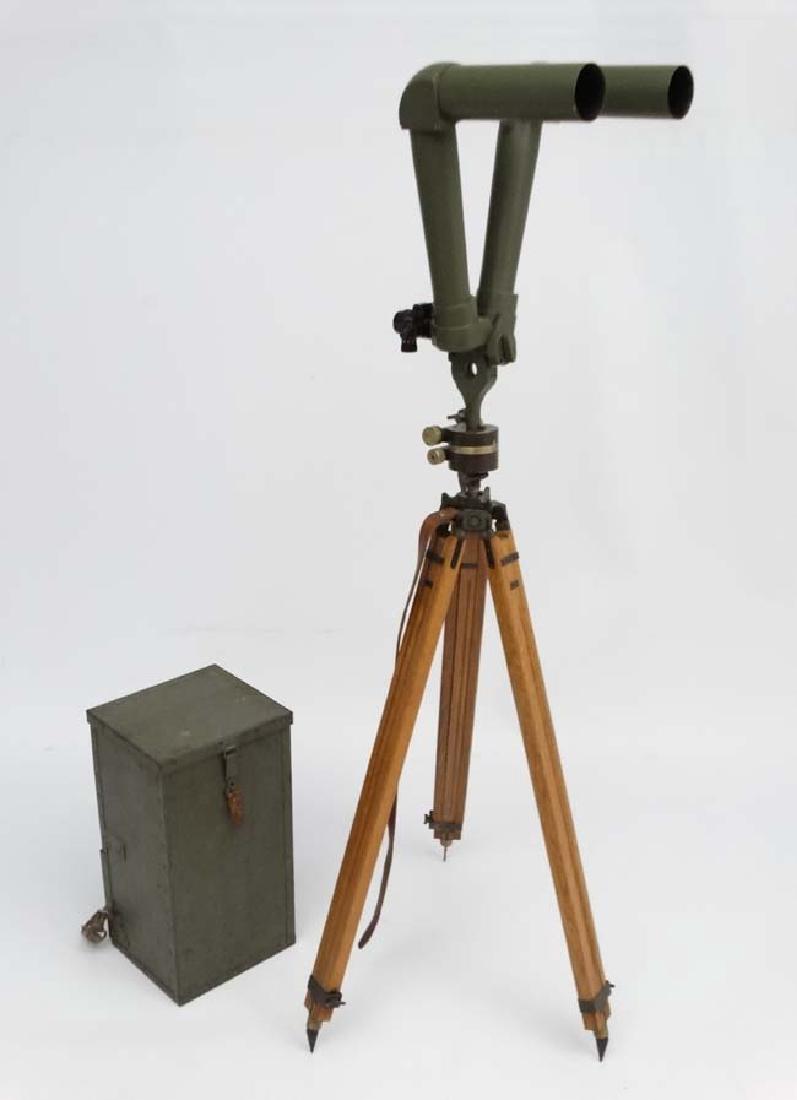 Militaria : A pair of French WWII Periscope / Trench: Militaria : A pair of French WWII Periscope / Trench Binoculars , stamped ' ''MG'' Mle 1939 ' by Eta A Debrie , Paris , serial number 753 . Together with tripod stand and carry case . Standing 58'' ta