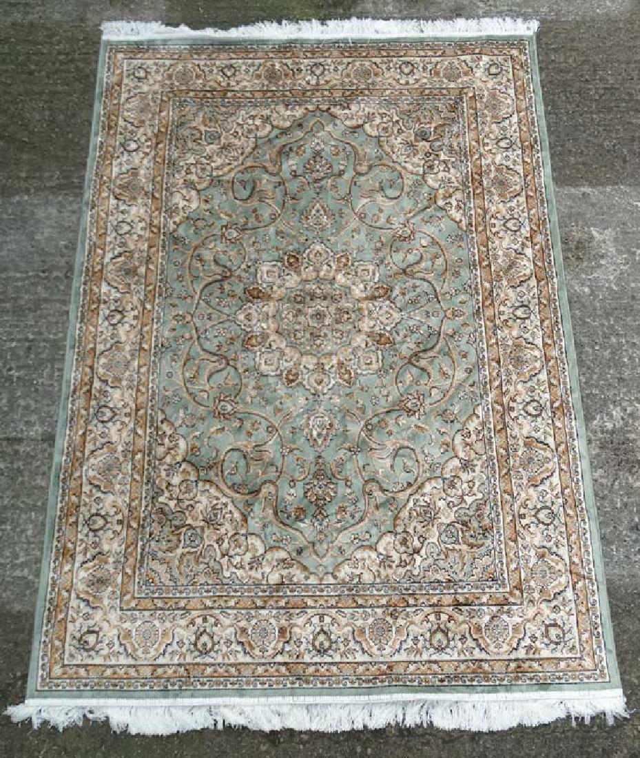 Carpet / Rug : A machine made prayer rug , in the: Carpet / Rug : A machine made prayer rug , in the Aubusson style , with a central ground of sage green with black, gold, buff colours with a double thin banded single wide band , 52 x 80''.