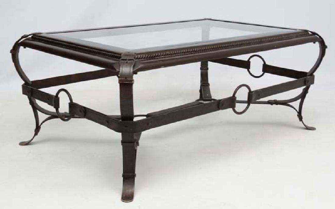 Mid Century Modern : a Jacques Adnet style, Hermes: Mid Century Modern : a Jacques Adnet style, Hermes style coffee table with a painted metal ( faux leather straps ) and bevelled glass top , measuring 46 x 28 x 18'' high.