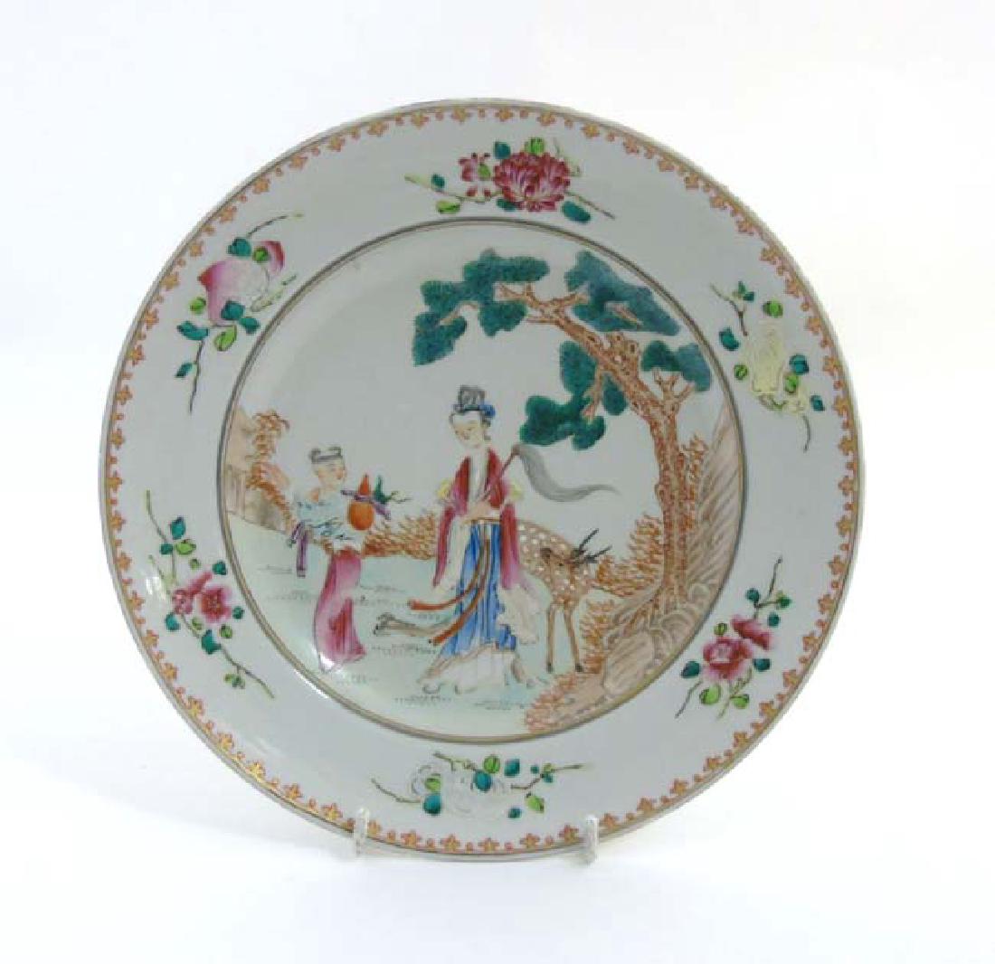 A Chinese famille rose plate decorated with polychrome (1 of 6)