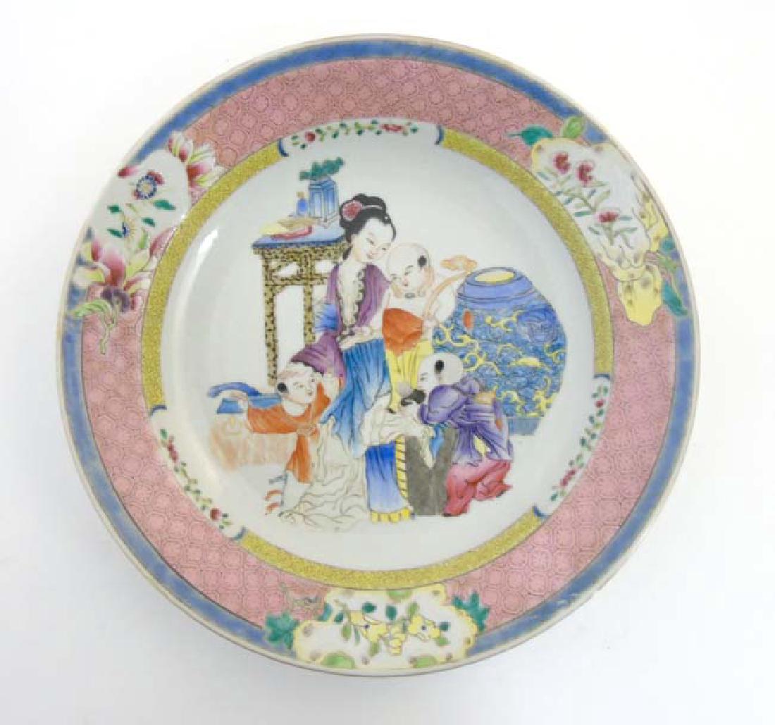 A Chinese famille rose plate with enamel decoration (1 of 6)