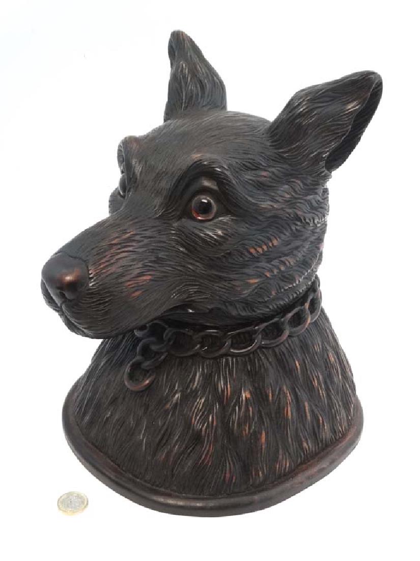 A large Black Forest table top box / tobacco jar: A large Black Forest table top box / tobacco jar formed as the carved head of a dog with glass eyes. 21stC 12'' high