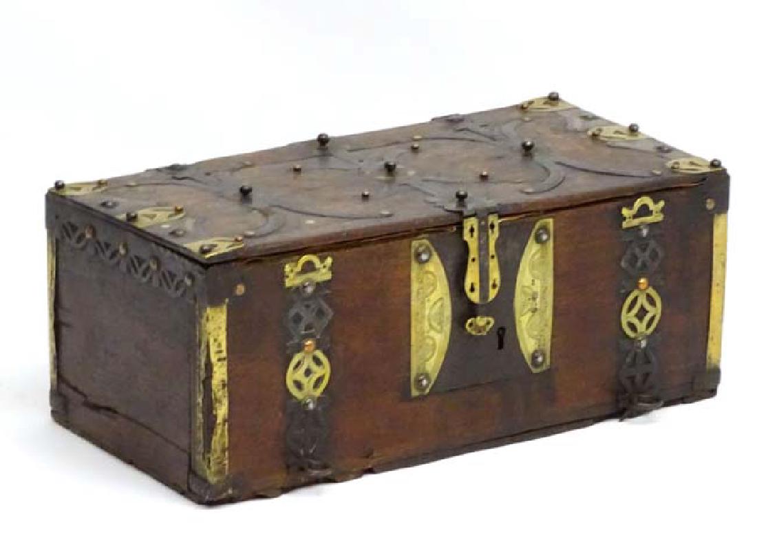 A Renaissance? steel copper and brass with punch: A Renaissance? steel copper and brass with punch decorated hardwood box / small chest opening to reveal later lining. Possibly a gold storage box / chest. with spherical cabochon decoration 23 1/3'' l
