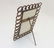 An Edwardian copper photograph frame with curved chain - 5