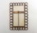 An Edwardian copper photograph frame with curved chain - 6