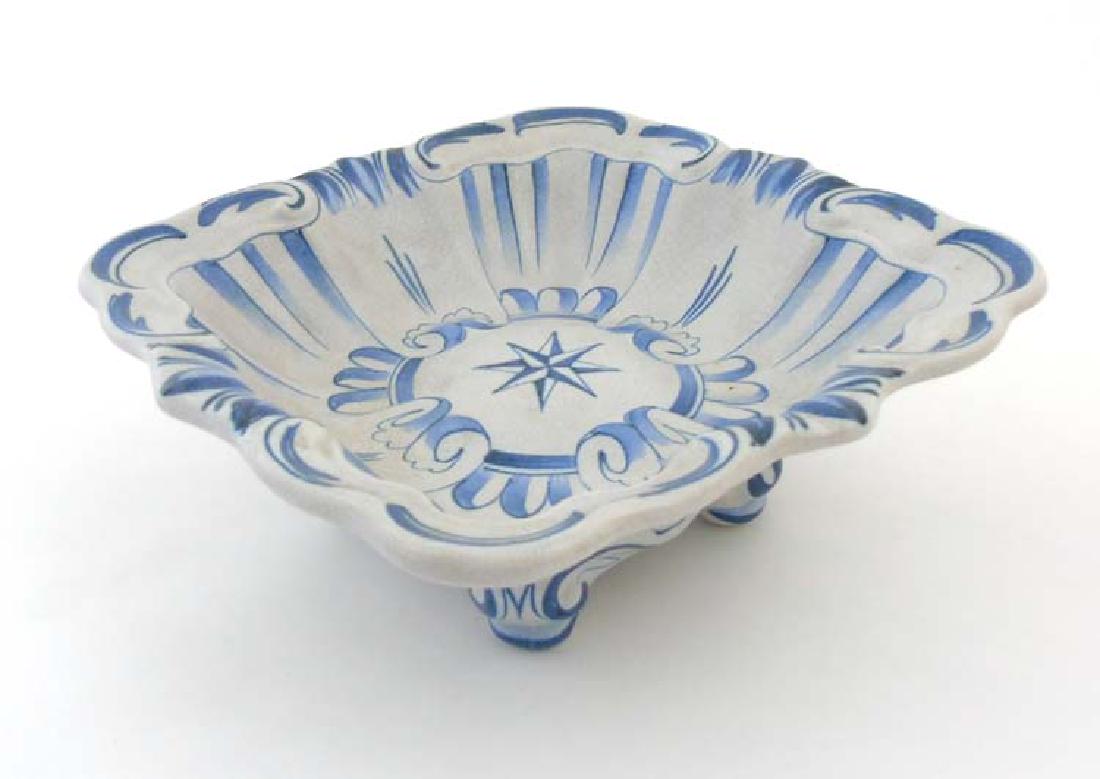 Scandinavian Studio Pottery: A Swedish bowl by Bo: Scandinavian Studio Pottery: A Swedish bowl by Bo Fajans Gävle, Sweden, possibly by Allan Ebeling, having blue scroll decoration and nautical star to centre, on a light grey crackled ground, makers m