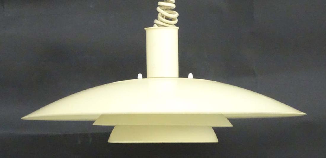 Vintage Retro : A Danish designed Rise and Fall Pendant: Vintage Retro : A Danish designed Rise and Fall Pendant light / Lamp by LYFA with white livery, model Derby ,labelled under , measuring 18 1/2'' diameter.