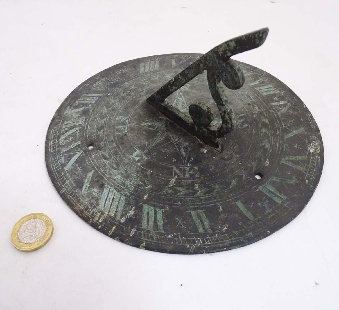 Sundial : An old bronze circular sundial with: Sundial : An old bronze circular sundial with veredegris , measuring 8'' diameter and 4 1/4'' high
