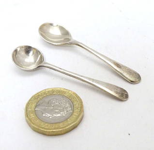 A small silver mustard spoon hallmarked Birmingham 1919: A small silver mustard spoon hallmarked Birmingham 1919 maker E S Barnsley & Co. together with a salt spoon hallmarked Birmingham 1925 maker William Suckling Ltd. 2 1/4'' long (2)