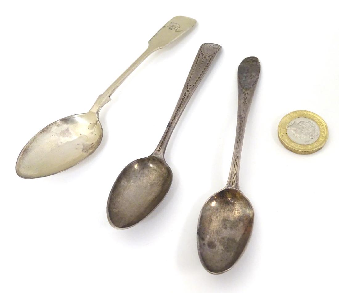 3 various silver teaspoons spoons comprising 2 Georgian: 3 various silver teaspoons spoons comprising 2 Georgian examples with bright cut decoration ( one hallmarked London 1788 maker George Gray ) Together with a Victorian fiddle pattern teaspoon hallmarke