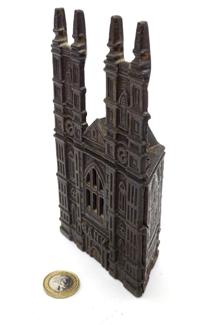 Cast Iron Money Box : a circa 1908 money box formed as: Cast Iron Money Box : a circa 1908 money box formed as Westminster Abbey ( Cathedral Still ) showing the Gothic Frontage of the abbey , bears the registration number 502035 , measuring 6 3/8'' high