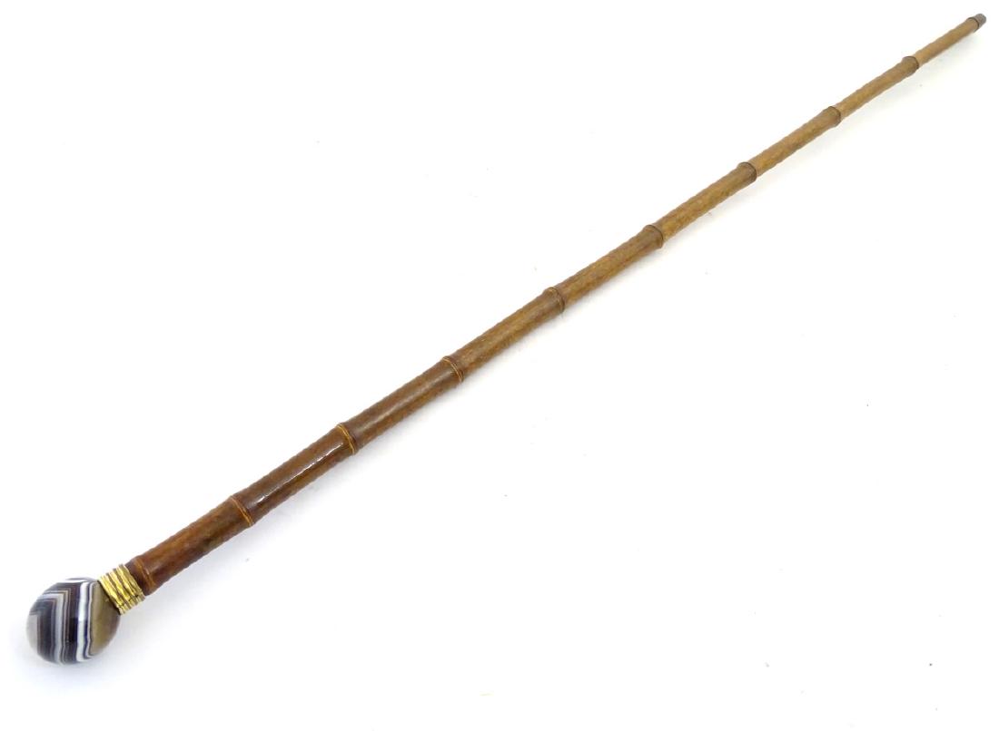 A bamboo walking cane / stick surmounted by agate knop (1 of 6)