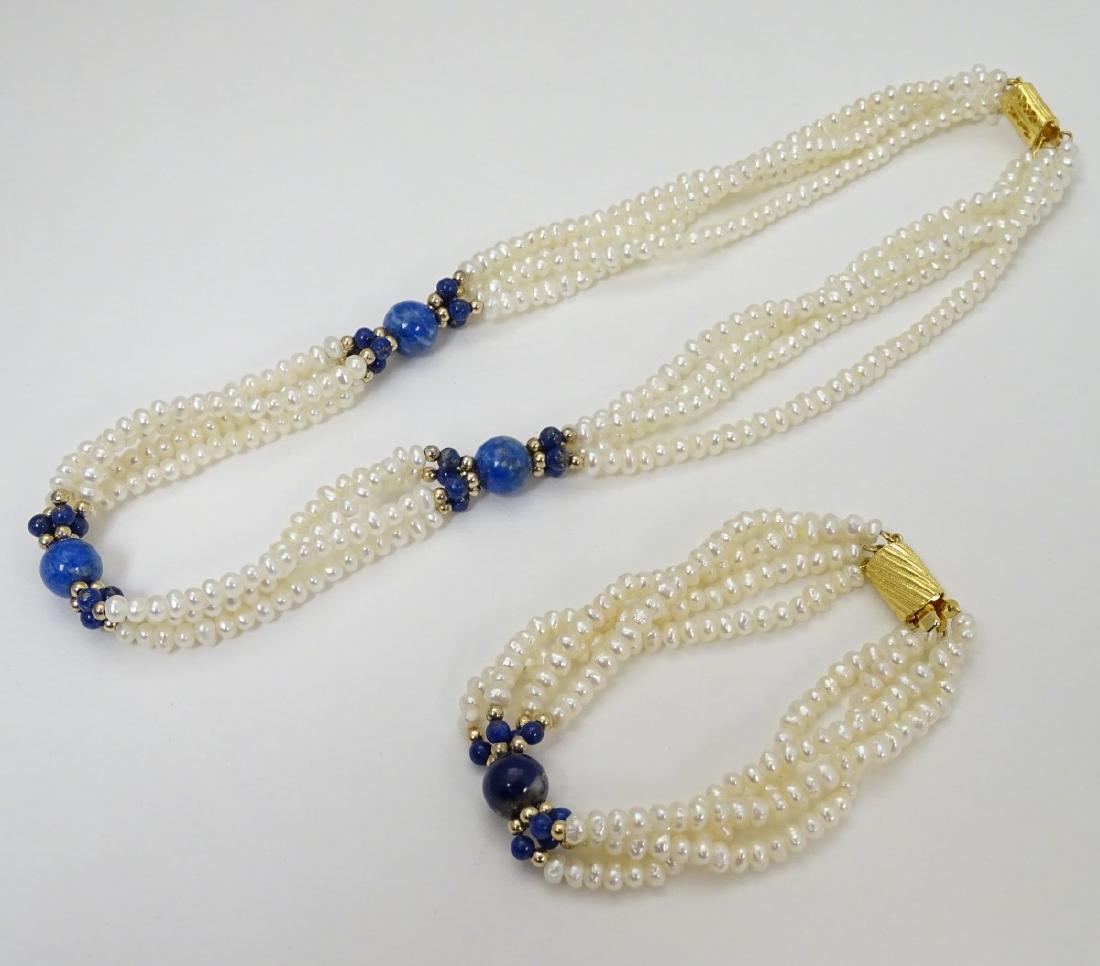 A 4 strand pearl necklace with lapis lazuli beads and (1 of 5)