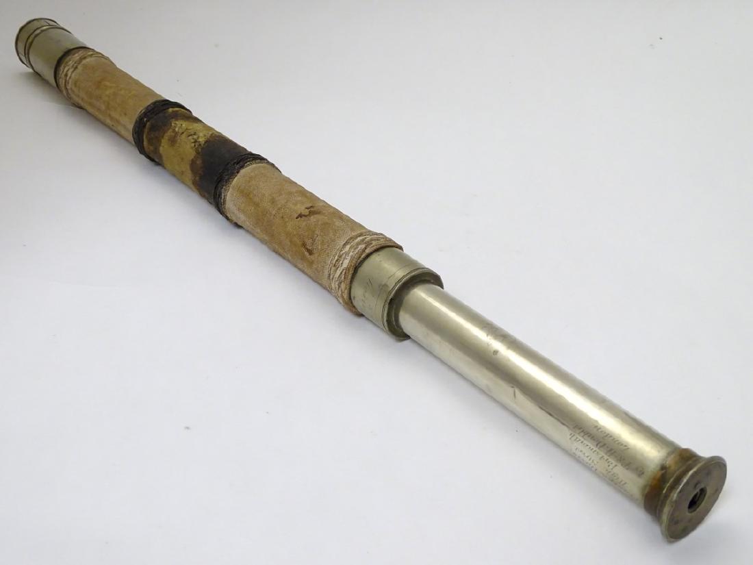 Militaria: A 19thC Naval Officer's single-drawer: Militaria: A 19thC Naval Officer's single-drawer telescope, of steel and brass construction with canvasbound 'staff' grip. The eyepiece section engraved 'Fraser & Davis. High Street Portsmouth. By T&H