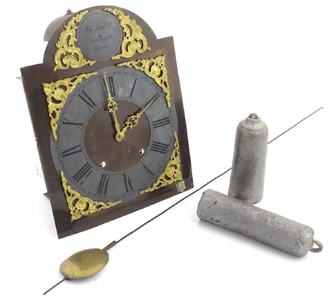 CH Gallet, Horloger Eecloo: (Belgium) a Continental: CH Gallet, Horloger Eecloo: (Belgium) a Continental wall clock, signed, with 12 1/4'' breakarch dial , 8 day weight driven movement striking on a large bell with brass hands and cast spandrels etc.