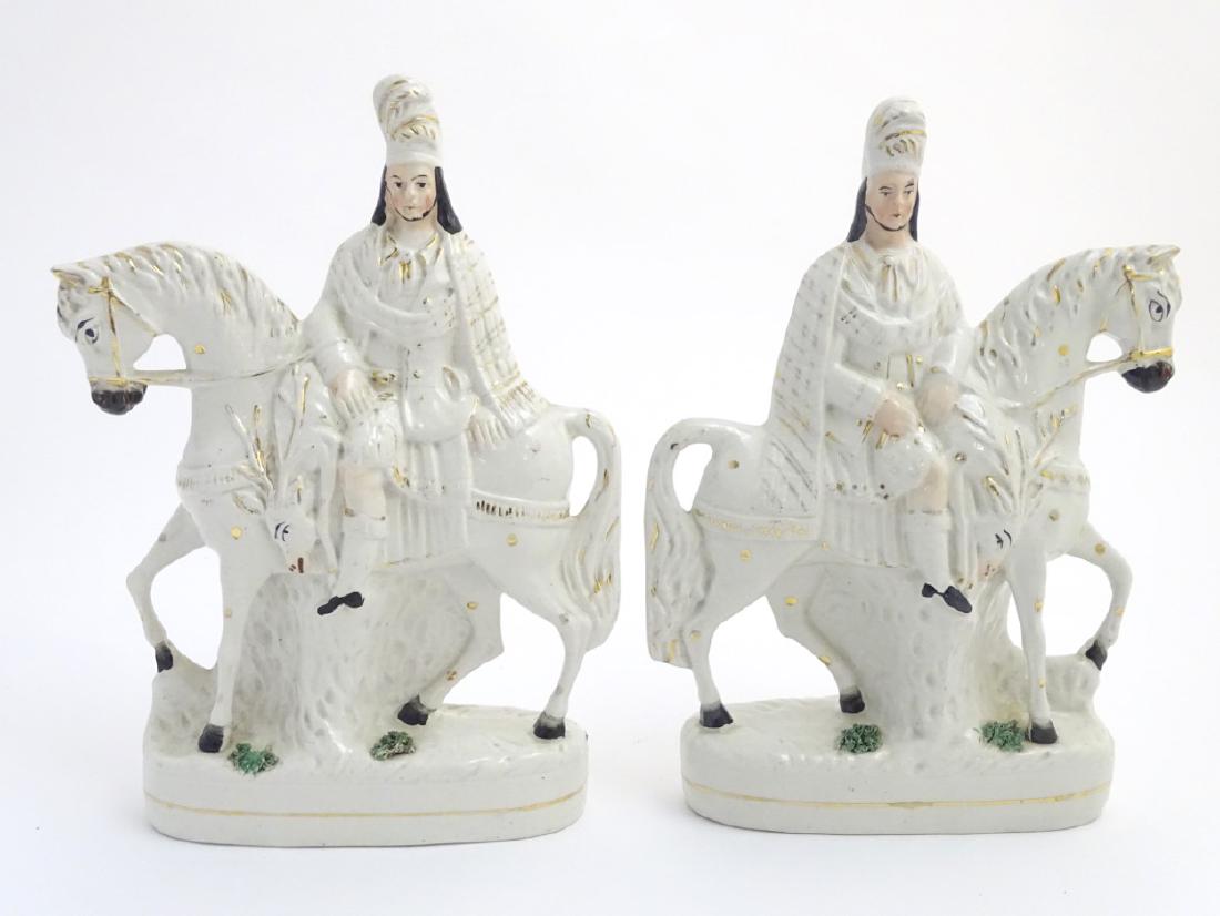 A pair of Victorian Staffordshire pottery flatback: A pair of Victorian Staffordshire pottery flatback figures modelled as Bonnie Prince Charlie on horseback, with gilt highlights. Approx. 14 1/4'' high. (2)