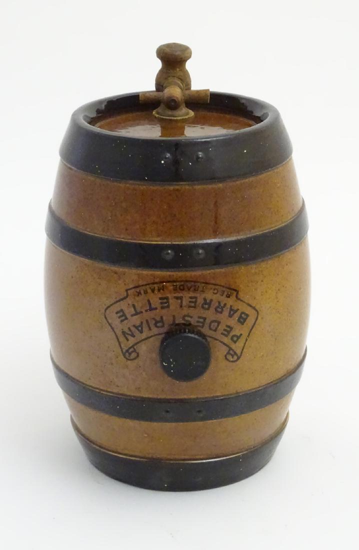 A Doulton Lambeth stoneware 'Pedestrian Barrelette'.: A Doulton Lambeth stoneware 'Pedestrian Barrelette'. Approx. 9'' high
