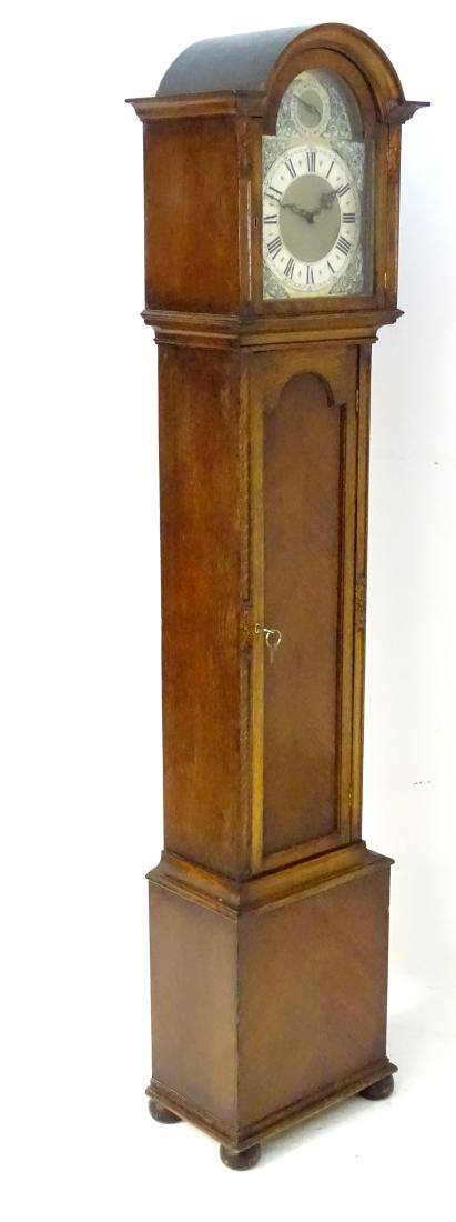 1920s oak three train longcase: an oak cased 8 day,: 1920s oak three train longcase: an oak cased 8 day, weight driven grandfather clock striking on Westminster, St. Michael or Whittington chimes on the 1/4, 1/2, 3/4 and hour, with chime / silent at 3 a