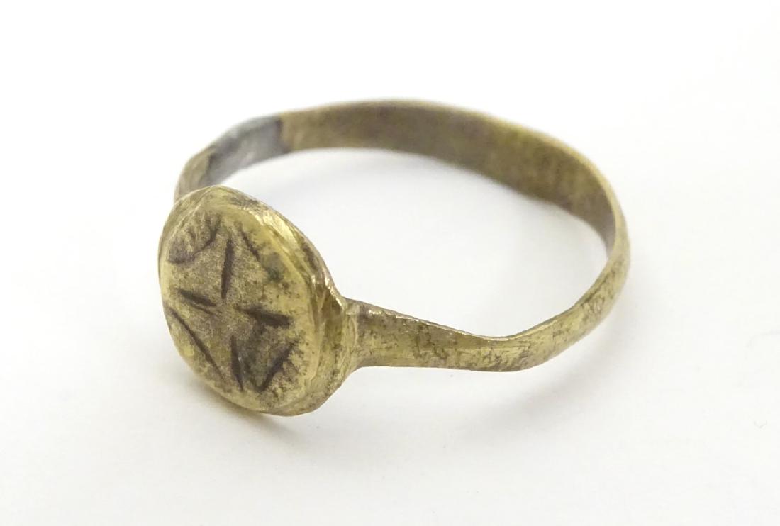 An antique ring with cross decoration reputed to be: An antique ring with cross decoration reputed to be from the Roman / Byzantine period.