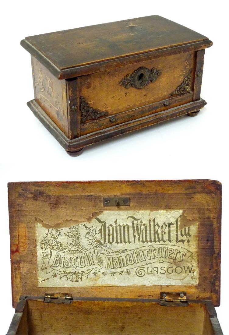 'John Walker Biscuit Manufacturers, Glasgow', a wooden: 'John Walker Biscuit Manufacturers, Glasgow', a wooden box with applied embossed brass decoration and label to inside of lid, 6'' wide.