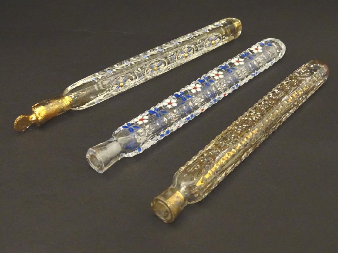 Haunton-Barron Scent Bottle Collection : three Georgian: Haunton-Barron Scent Bottle Collection : three Georgian circa 1800 freeblown scent bottles, of squared and oblong cross sectional form, all profusely decorated, two with enamel decoration in white, bl