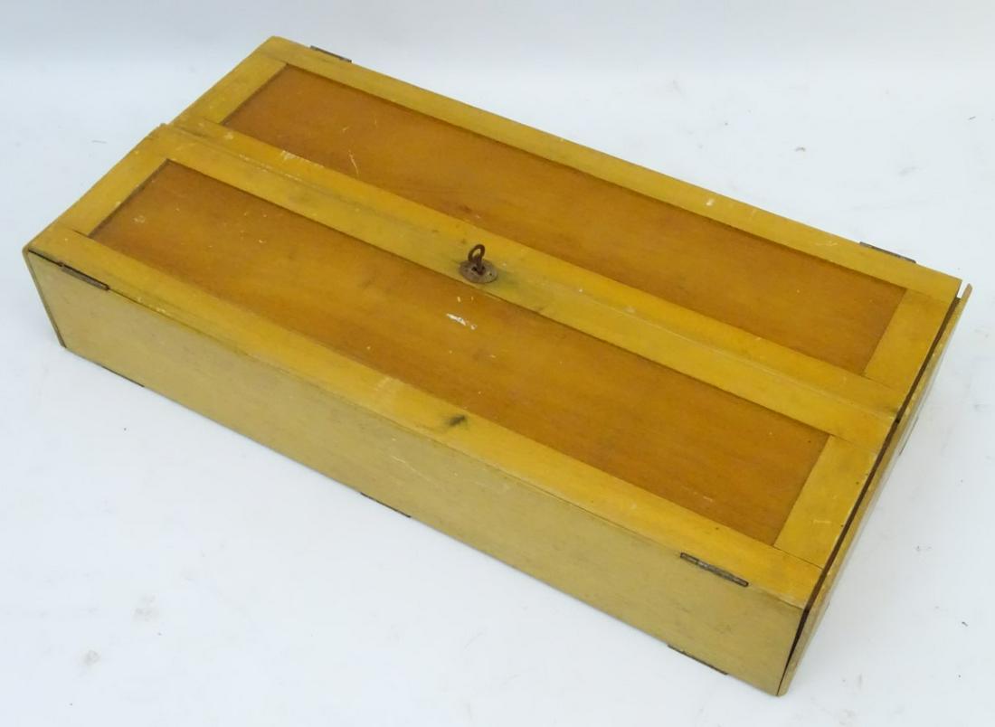 A wooden box containing a quantity of assorted vintage: A wooden box containing a quantity of assorted vintage tools etc.