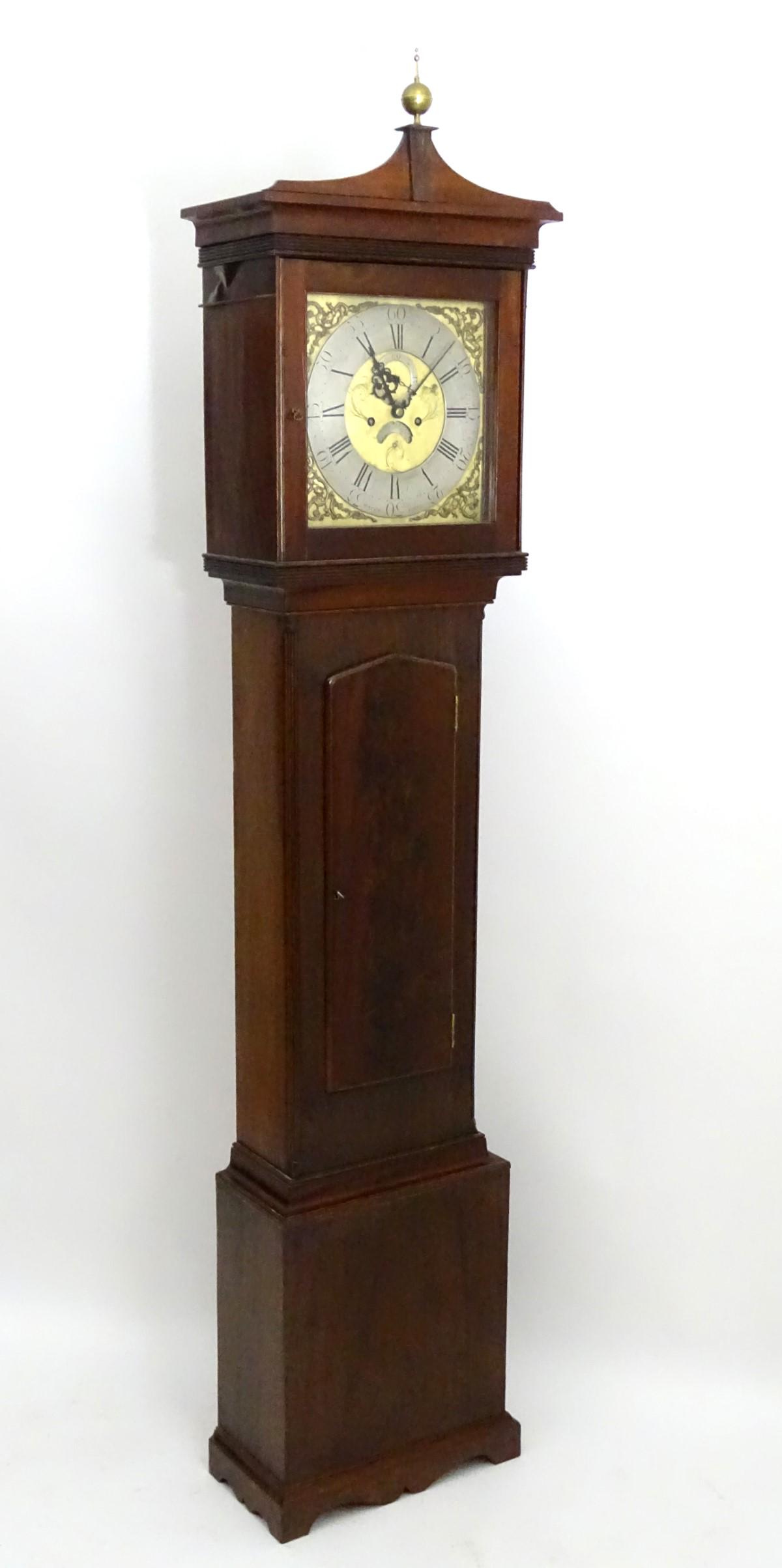 Longcase clock: 'John Taylor, Waterford', a Georgian: Longcase clock: 'John Taylor, Waterford', a Georgian Irish 8-day mahogany cased 13'' brass dial grandfather clock with applied silver chapter ring, inset seconds dial and moustache date aperture, stri