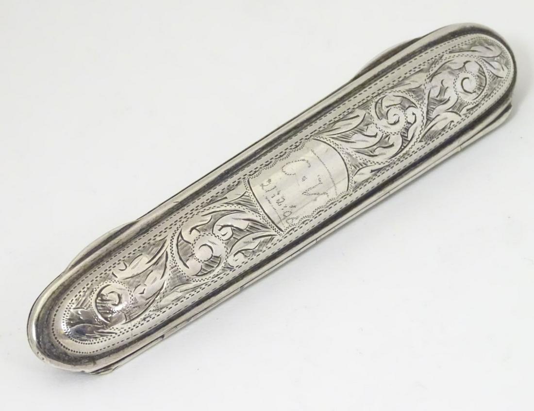 A silver single cigar case with engraved decoration.: A silver single cigar case with engraved decoration. Hallmarked Birmingham 1900 maker Hilliard & Thomason 4 3/4'' long