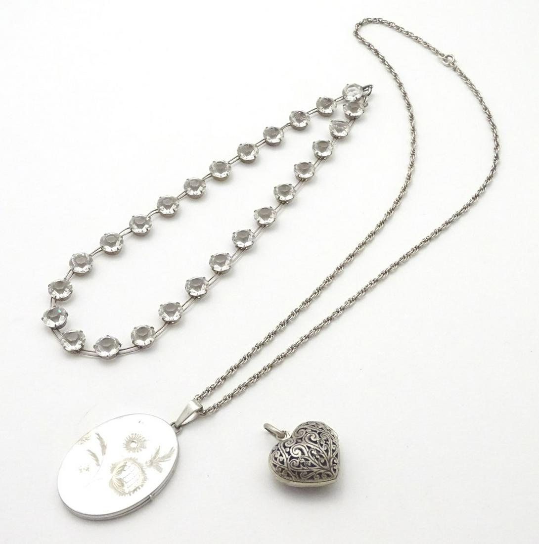 Assorted jewellery including a silver heart shaped: Assorted jewellery including a silver heart shaped locket pendant etc (3)