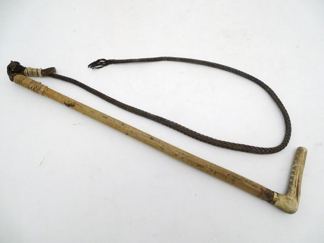 Hunting: a whip / crop with antler end, bamboo shaft: Hunting: a whip / crop with antler end, bamboo shaft and plaited leather whip, the whip handle 20'' long