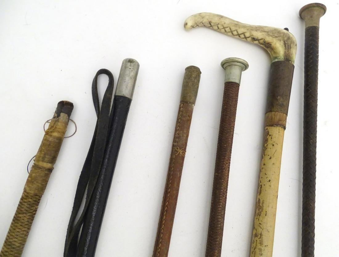 A quantity of assorted hunting whips and riding crops.: A quantity of assorted hunting whips and riding crops. Together with an antler handled cane / stick. Longest approx. 36'' long. (6)