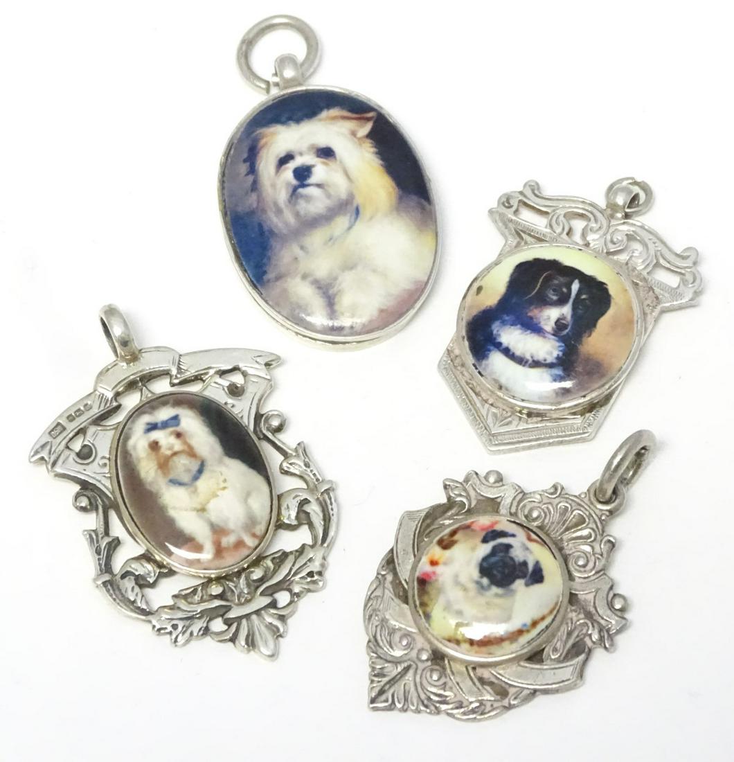 Assorted silver and silver plate fob with later applied: Assorted silver and silver plate fob with later applied enamel decoration depicting various dogs. (4)