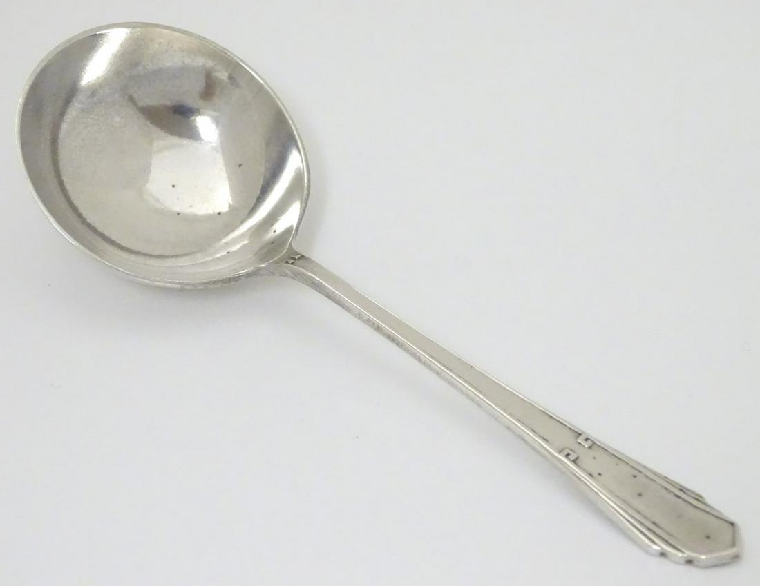 An Art Deco silver preserve spoon hallmarked Sheffield: An Art Deco silver preserve spoon hallmarked Sheffield 1922 maker Joseph Elliot & Sons. 4 1/4'' long